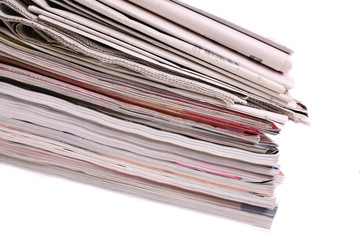 stack of newspapers isolated on white