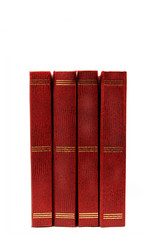 Four red books with textured covers on white background