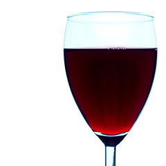 High-contrast studio shot of a back-lit red wine glass