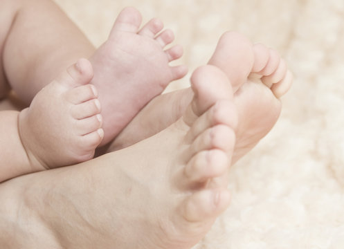 Mother and baby's feet