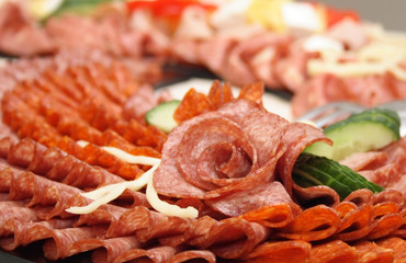 food background with nice rose from salami