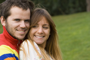 Romantic couple outdoor, showing their love