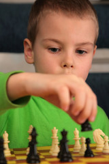boy play chess