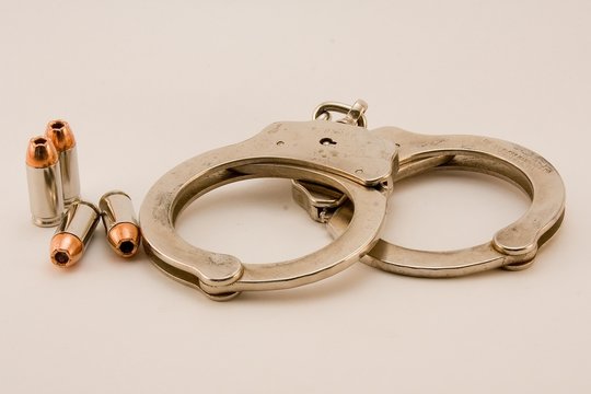 Handcuffs and Bullets