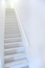 narrow white ladder stair