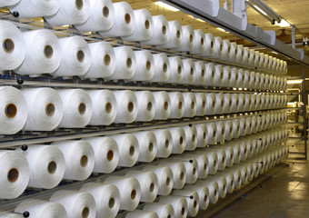 Numbers of coils with synthetic threads