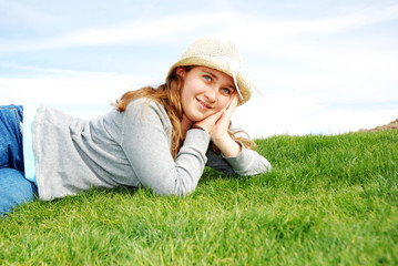 young girl is enjoying herself at outdoor location