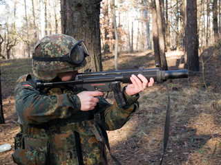 Fototapeta premium Soldier aiming the target