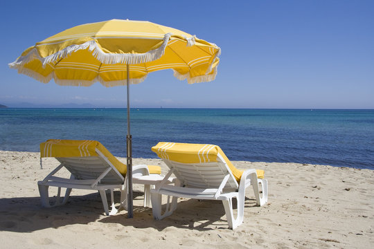 lounge chairs on the beach of saint-tropez 