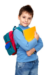 Smiling schoolboy. Isolated over white background.