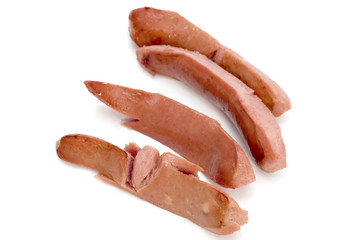 object on white food small sausage