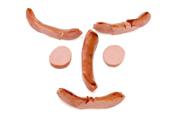 object on white food small sausage