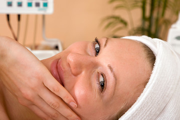 beautiful young woman happy at the spa center