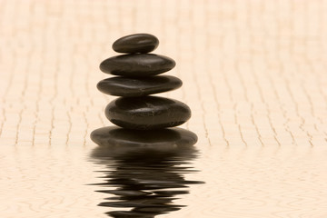 Fototapeta na wymiar Stack of black massage stones