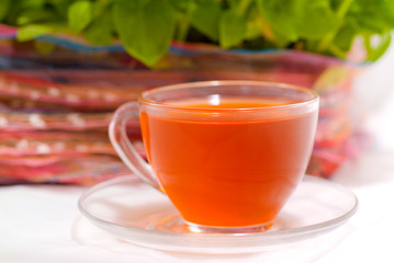 Tea in a transparent glass.