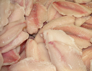 frozen fish fillet on market refrigerator