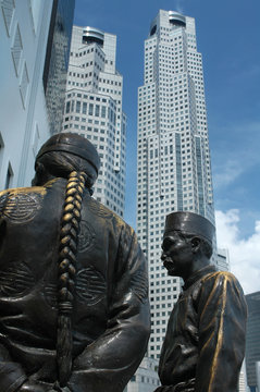 Art statues in Singapore with hirise building on background
