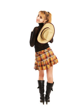 cowgirl in a hat isolated on white