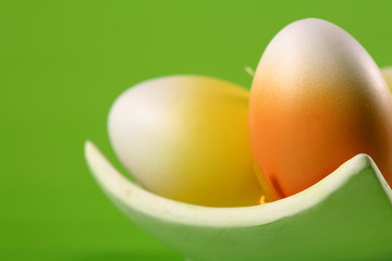 Funny easter eggs on green backgroung.