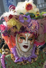 Woman Carnival Venetian mask with colorful ruffles