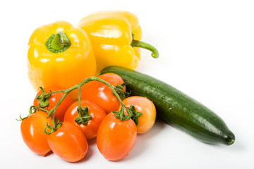 yellow sweet pepper red tomato and green cucumber