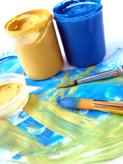 blue and yellow paint jar with gouache