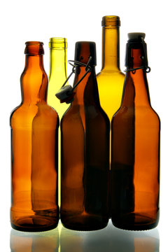 Empty bottles isolated over a white background