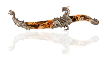 An ancient knife in scabbards isolated on a white background