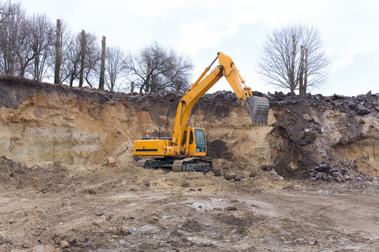 Yellow excavator at work