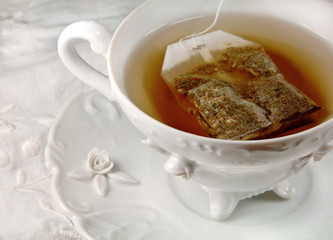 Hot Tea in a white antique tea cup.