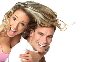 Young love couple smiling. Over white background  .