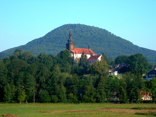Fototapeta na wymiar Beautiful monastery below the hill in the Czech Republic