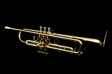 gold lacquer trumpet with mouthpiece on black © bota horatiu