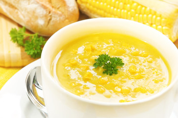 Corn and parsley soup with fresh sourdough bread.