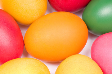Colorful Easter eggs in red, yellow, orange and green color