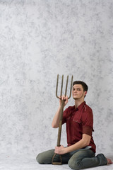 Man and His Pitchfork
