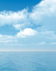 Wonderful seascape with puffy clouds