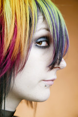 Close-up of an alternative girl with multi-colred hair 