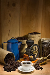 Coffee cup and saucer against a rustic background