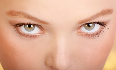 Beautiful young woman face. Close up.