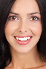 Beautiful young woman face. Close up.