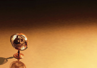 A Background showing a caged brass metalic structure