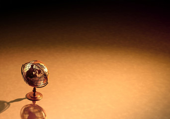 A Background showing a caged brass metalic structure