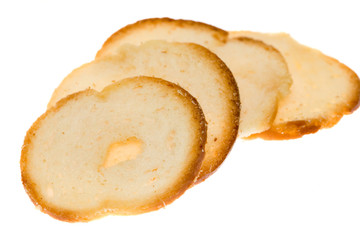 Toasted bagel slices isolated on white background.