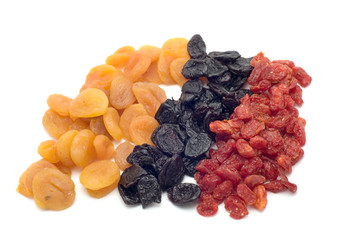 object on white food colored dried fruits