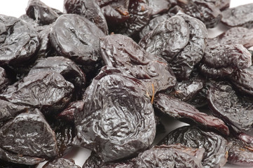 object on white food colored dried fruits
