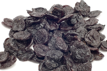 object on white food colored dried fruits