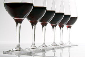 A Row of Glasses with Red Wine