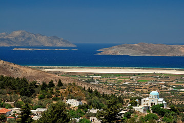 Greek church on Kos island and sea with island in the back