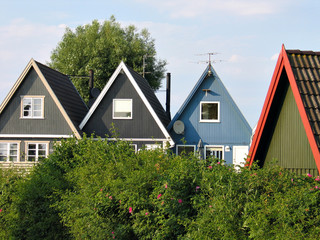 Wooden colorful beach vacation houses in Denmark